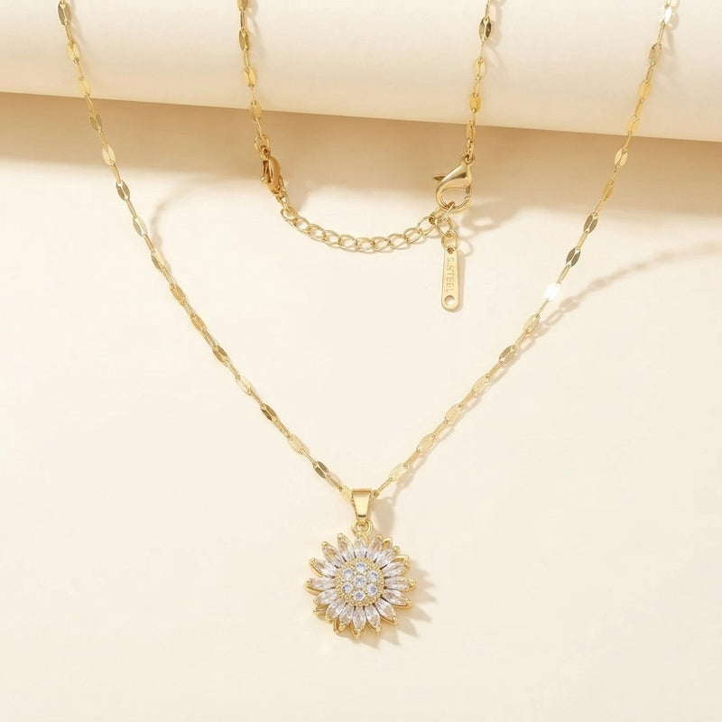 Collar girasol giratorio de oro