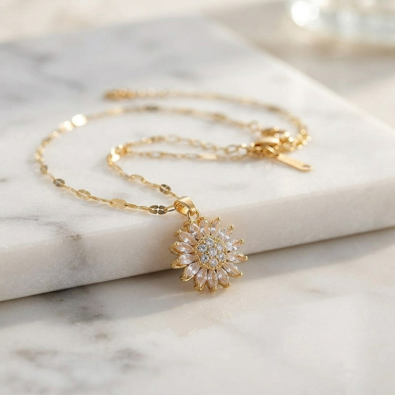 Collar girasol giratorio de oro